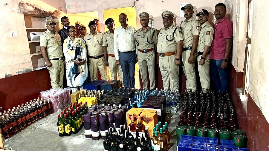 <div class="paragraphs"><p>Excise officials during one of the raids. </p></div>