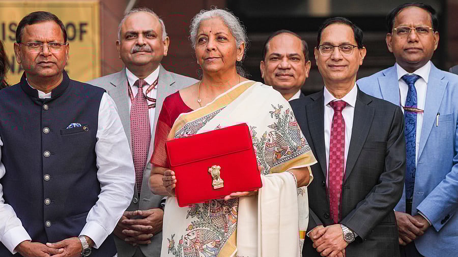 <div class="paragraphs"><p>New Delhi: Union Finance Minister Nirmala Sitharaman with Union Minister of State for Finance Pankaj Chaudhary and other officials outside the Finance Ministry ahead of the presentation of ‘Union Budget 2025-26’, in New Delhi, Saturday, Feb. 1, 2025.</p></div>