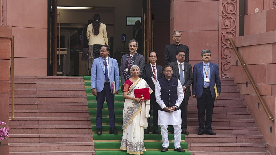 <div class="paragraphs"><p>Union Finance Minister Nirmala Sitharaman with Union Minister of State for Finance Pankaj Chaudhary and other officials upon her arrival at the Parliament House complex to present the ‘Union Budget 2025-26.</p></div>
