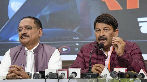 <div class="paragraphs"><p>BJP MP Manoj Tiwari and the party’s Delhi President Virendra Sachdeva address the media during the launch of the party’s new campaign song for the upcoming Delhi Assembly elections, in New Delhi, Sunday, Feb. 2, 2025.</p></div>