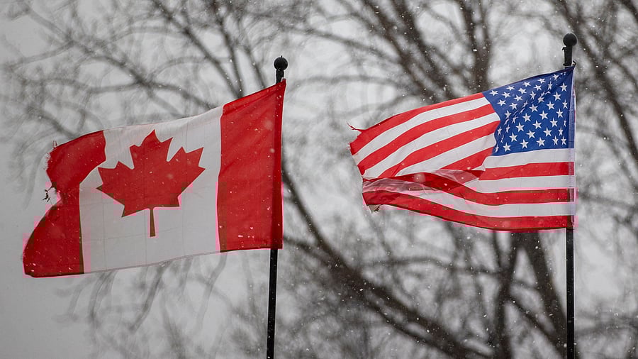 <div class="paragraphs"><p>A Canadian and a US flag wave in the wind in Niagara Falls, Ontario, Canada.&nbsp;</p></div>