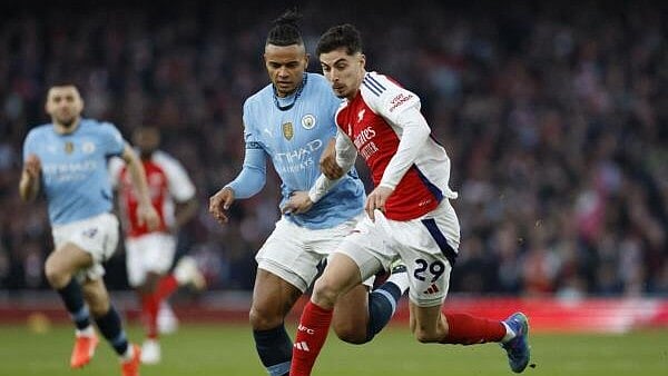 <div class="paragraphs"><p>Arsenal's Kai Havertz in action with Manchester City's Manuel Akanji Action</p></div>