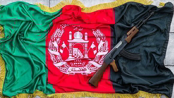 <div class="paragraphs"><p>Image of a rifle placed on the flag of Afghanistan. (For representation)</p></div>