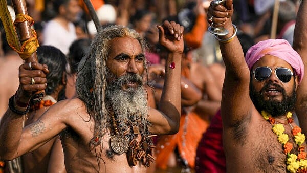 <div class="paragraphs"><p>Sadhus take a holy dip at the Sangam on the occasion of 'Basant Panchami' during the ongoing Mahakumbh Mela, in Prayagraj, Monday, Feb. 3, 2025.</p></div>