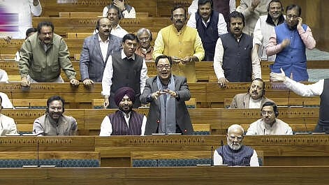 <div class="paragraphs"><p>Union Minister Kiren Rijiju speaks in the Lok Sabha, as Prime Minister Narendra Modi looks on during the Budget session of Parliament, in New Delhi.&nbsp;</p></div>