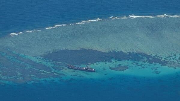 <div class="paragraphs"><p>Philippine Coast Guard flyby over the South China Sea</p></div>