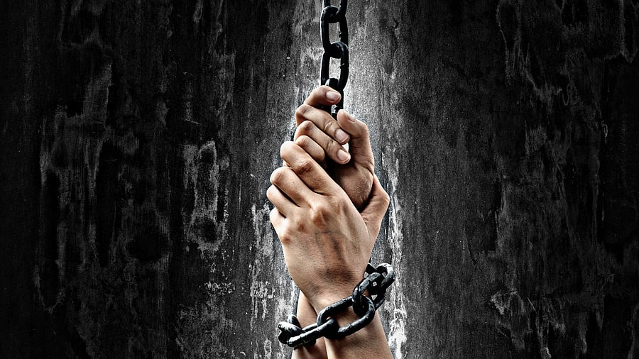 <div class="paragraphs"><p>Representative image showing a hand in chains</p></div>