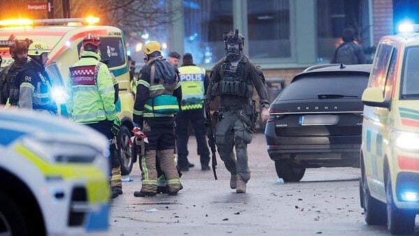 <div class="paragraphs"><p>Emergency personnel and police officers work at the adult education center Campus Risbergska school after a shooting attack in Orebro, Sweden.</p></div>