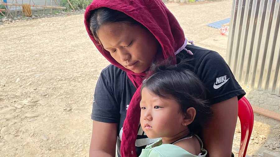 <div class="paragraphs"><p>A woman and her child in violence-hit Manipur. Image for representational purposes.</p></div>