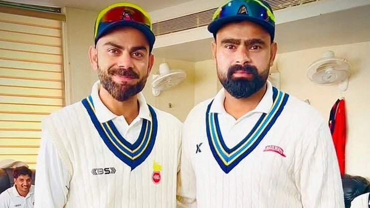 <div class="paragraphs"><p>Himangshu Sangwan along with Virat Kohli.</p></div>