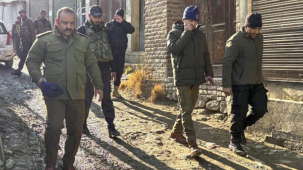 <div class="paragraphs"><p>Security personnel keep vigil after a militant attack, in Kulgam district, on Monday.</p></div>