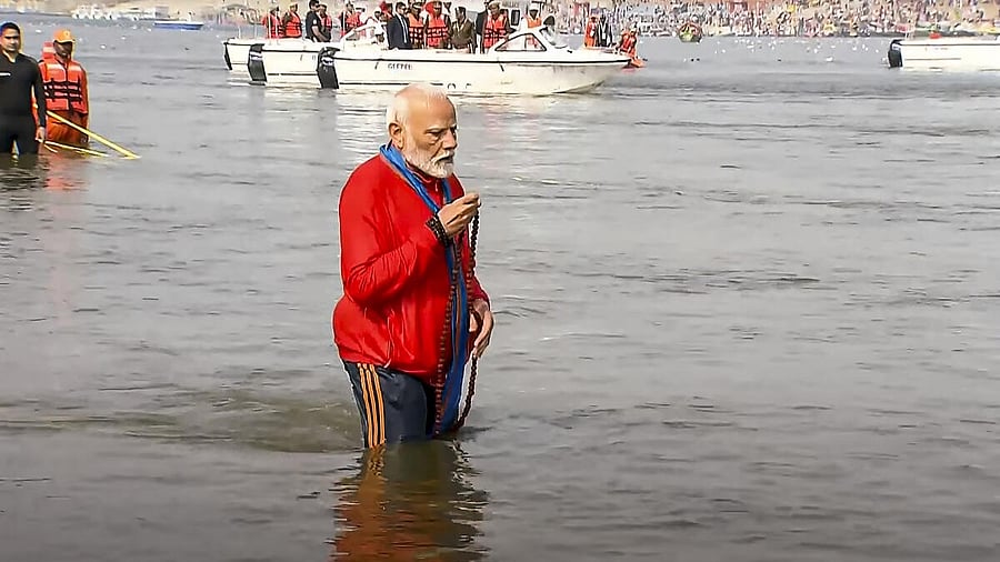 <div class="paragraphs"><p>Prime Minister Narendra Modi takes a holy dip at Sangam during the ongoing Maha Kumbh Mela, in Prayagraj</p></div>
