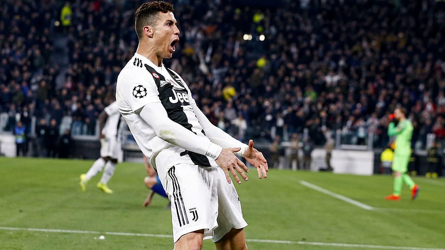 <div class="paragraphs"><p>Cristiano Ronaldo celebrates during his time with Juventus</p></div>