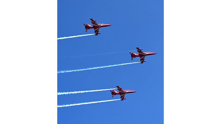 <div class="paragraphs"><p>Indian Air Force's acrobatic team, Suryakiran, performs a sortie during the rehearsals at the Yelahanka Air Force Station.</p></div>