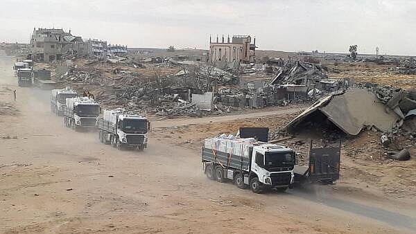 <div class="paragraphs"><p>Trucks carrying aid move, amid a ceasefire between Israel and Hamas, in Rafah in the southern Gaza Strip.</p></div>