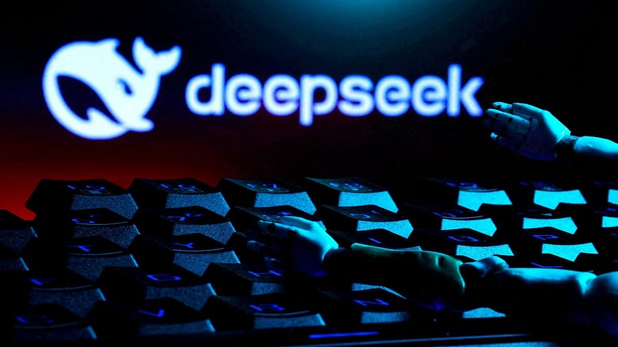 <div class="paragraphs"><p>The deepseek logo, a keyboard, and robot hands are seen in this illustration</p></div>