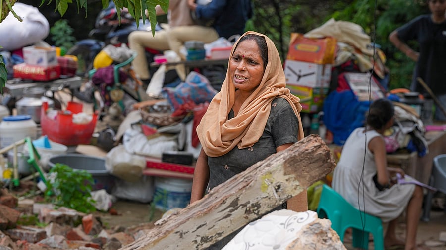 <div class="paragraphs"><p>A resident reacts during a drive to demolish illegal structures, at Khyber Pass, near Civil Lines, in New Delhi, Saturday, July 13, 2024. </p></div>