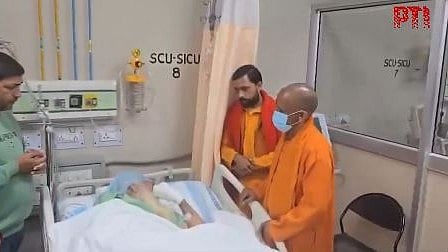 <div class="paragraphs"><p>Screengrab from video of UP CM Yogi Adityanath visiting&nbsp;Mahant Satyendra Das</p></div>
