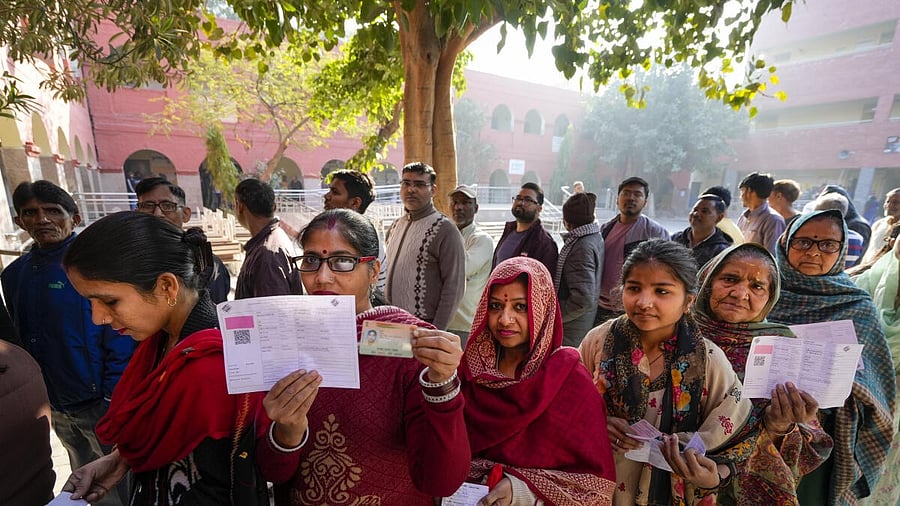 <div class="paragraphs"><p>People wait in queues to cast their votes at a polling booth during the Delhi Assembly elections, at Trilokpuri, in New Delhi, Wednesday, Feb. 5, 2025.</p></div>