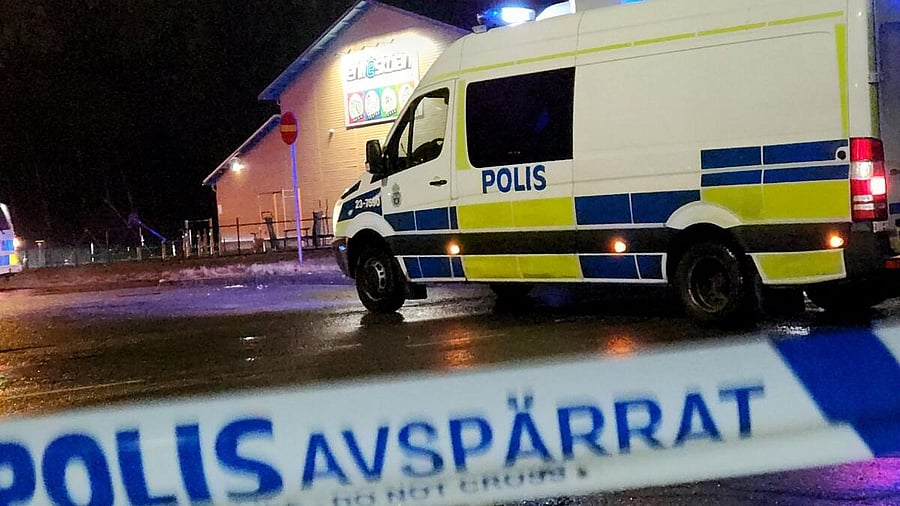 <div class="paragraphs"><p>A police van is pictured near the adult education center Campus Risbergska school after a shooting attack in Orebro.</p></div>