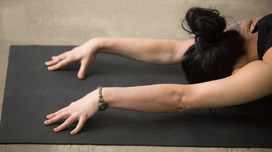 <div class="paragraphs"><p>Representative image of a woman practising yoga</p></div>