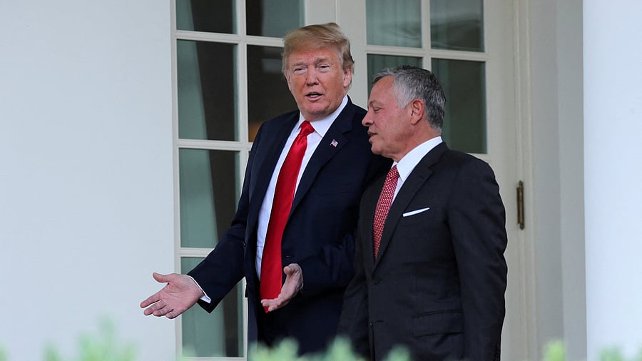 <div class="paragraphs"><p>US President Donald Trump walks down the West Wing colonnade with Jordan’s King Abdullah.</p></div>