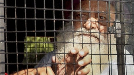 <div class="paragraphs"><p>File photo of Self-styled godman 'Asaram' after being produced at a court in Gandhinagar in connection with a sexual assault case.</p></div>