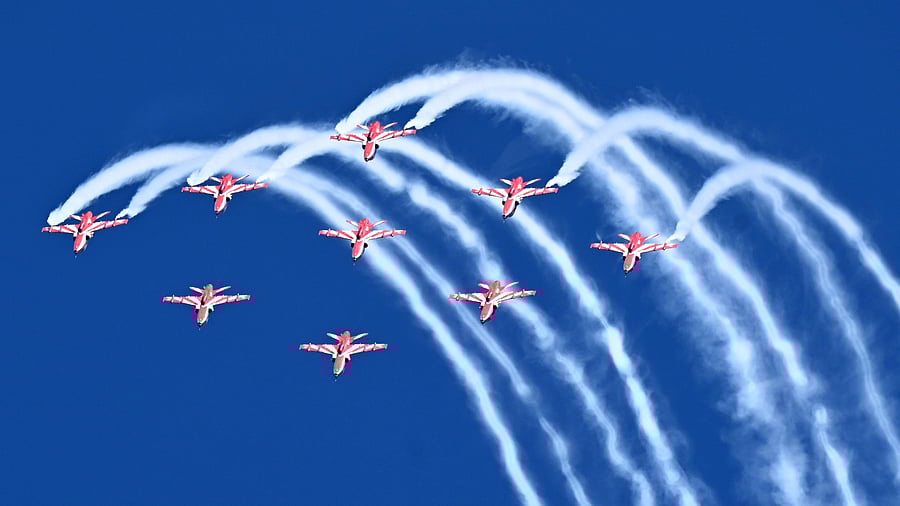 <div class="paragraphs"><p>The Surya Kiran Aerobatic Team (SKAT) performs a sortie during the dress rehearsal of Aero India 2025 at the Yelahanka Airbase.</p></div>
