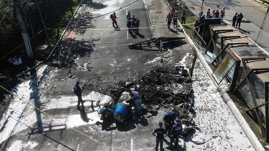 <div class="paragraphs"><p>Small plane crashes into vehicles on busy Sao Paulo avenue.</p></div>