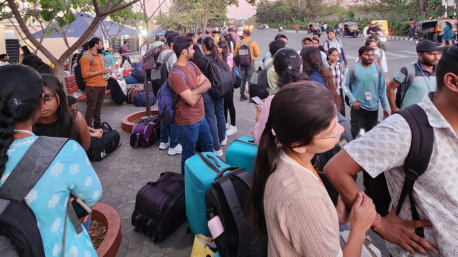 Retrenched employees seen leaving Infosys’ Mysuru training campus on Friday.