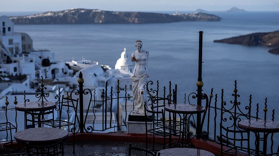 <div class="paragraphs"><p>A replica statue of Venus de Milo is seen at a closed cafe, during increased seismic activity on the island of Santorini, Greece</p></div>
