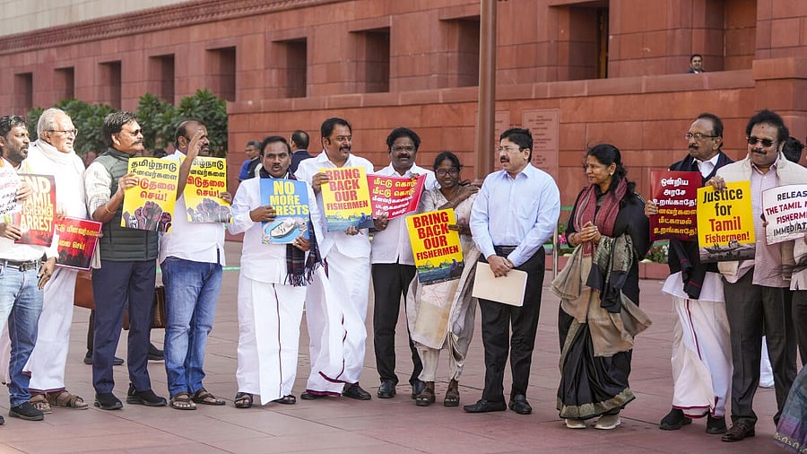 <div class="paragraphs"><p>DMK MPs stage a protest against arrest of fishermen by Sri Lankan Navy.</p></div>