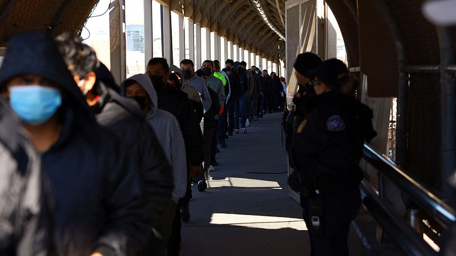 <div class="paragraphs"><p>Migrants line up to leave the United States for Mexico after being deported across the Paso del Norte international border bridge, after U.S. President Donald Trump promised mass deportation operation, as seen from Ciudad Juarez, Mexico January 23, 2025. </p></div>