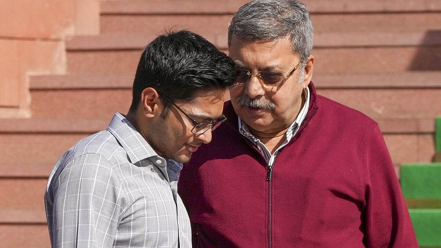 <div class="paragraphs"><p>TMC MPs Abhishek Banerjee (left) and Kalyan Banerjee during the Budget session of Parliament in New Delhi, on Friday.</p></div>