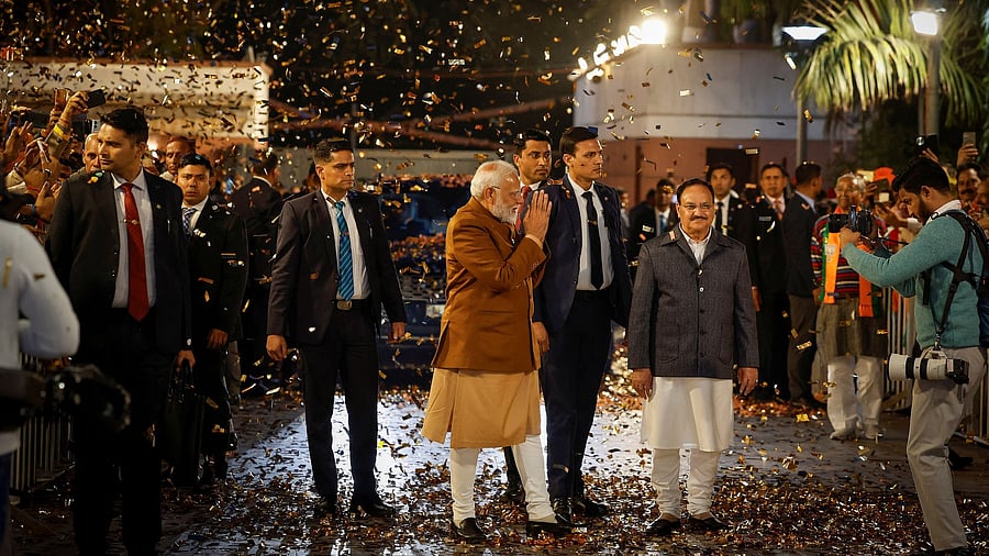 <div class="paragraphs"><p>Prime Minister Narendra Modi gestures at the Bharatiya Janata Party headquarters as BJP celebrates its win in the Delhi state assembly elections, in New Delhi, February 8, 2025. </p></div>