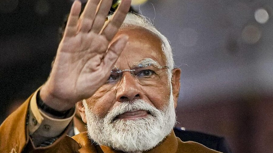 <div class="paragraphs"><p>Prime Minister Narendra Modi greets supporters.</p></div>