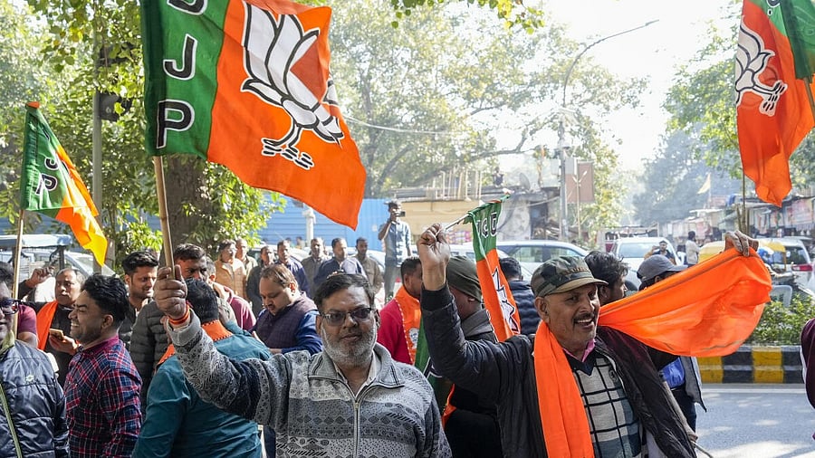 <div class="paragraphs"><p>BJP workers celebrate as early trends show the party's victory in Delhi Assembly polls, during counting of votes in New Delhi, Saturday, Feb. 8, 2025.</p></div>