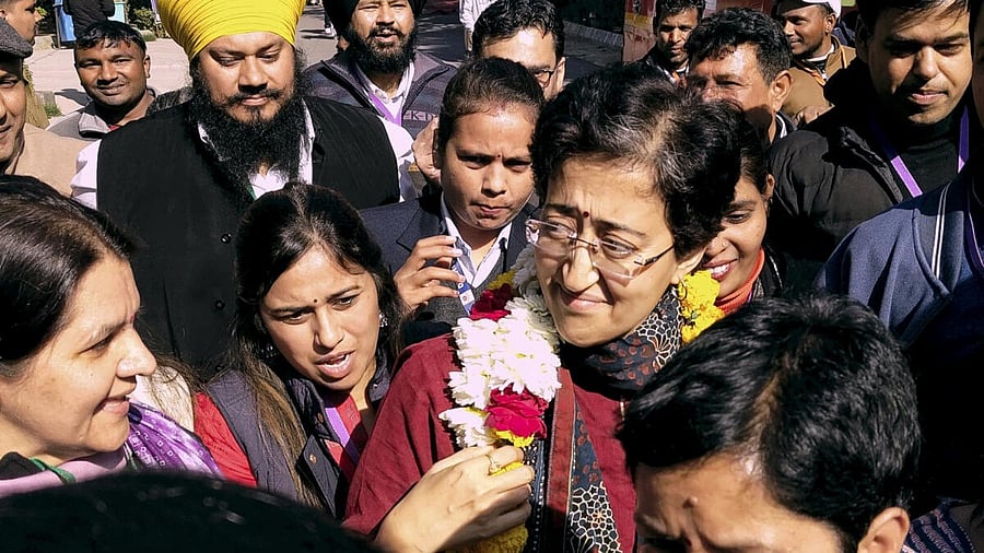 <div class="paragraphs"><p>Atishi celebrates her win with party workers. </p></div>