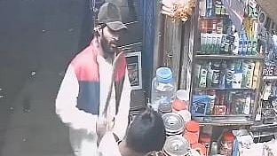 <div class="paragraphs"><p>A screengrab from the viral CCTV showing the suspect Gautham.</p></div>