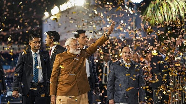 <div class="paragraphs"><p>Prime Minister Narendra Modi being welcomed upon his arrival after the BJP won the Delhi Assembly election, at the party HQ in New Delhi, Saturday.</p></div>