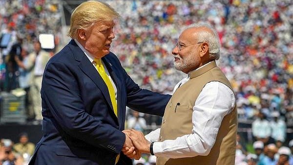 <div class="paragraphs"><p>Prime Minister Narendra Modi shakes hands with US President Donald Trump during the 'Namaste Trump' event at Sardar Patel Stadium in Ahmedabad.</p></div>