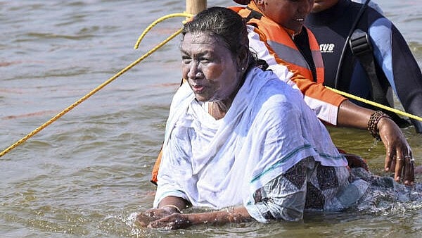 <div class="paragraphs"><p>President Droupadi Murmu takes a holy dip at the Sangam during Maha Kumbh Mela 2025, in Prayagraj.</p></div>