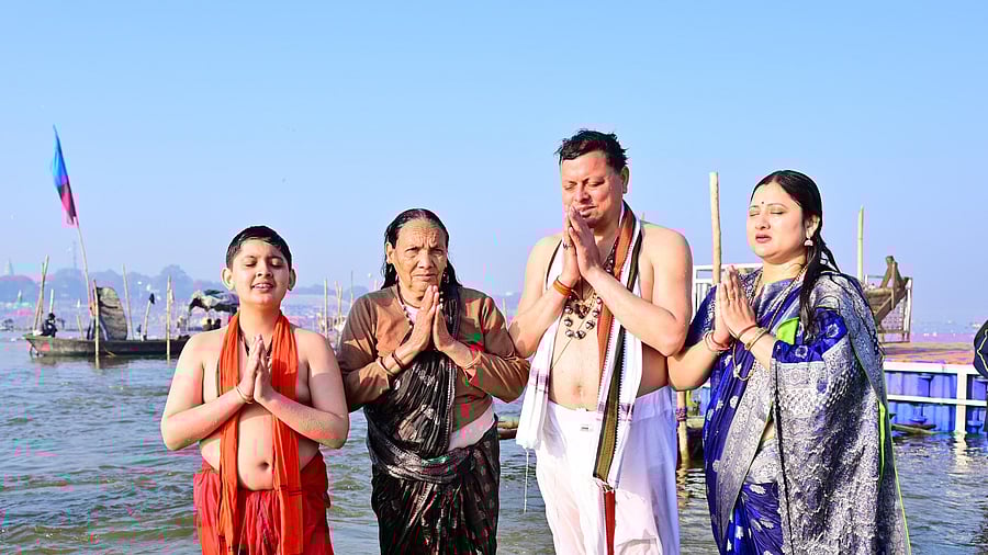 <div class="paragraphs"><p>Uttarakhand Chief Minister Pushkar Singh Dhami on Monday took a holy dip in the Sangam along with his mother, wife and son.</p></div>