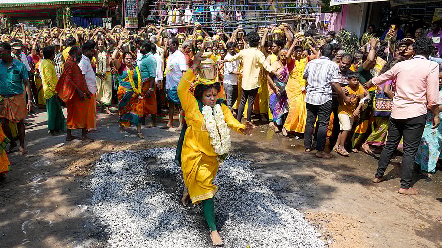 <div class="paragraphs"><p>A devotee walks the burning coal during the Thaipoosam festival at Vadapalani Murugan temple, in Chennai, Tuesday, Feb. 11, 2025.</p></div>