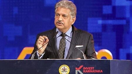 <div class="paragraphs"><p>Mahindra Group Chairman Anand Mahindra addresses a gathering during the Global Investors' Meet, in Bengaluru, Tuesday, Feb. 11, 2025.</p></div>