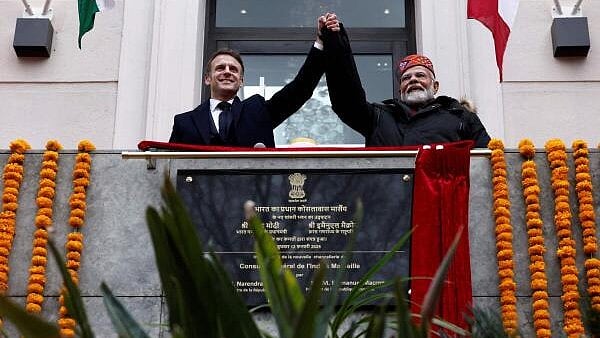 <div class="paragraphs"><p>French President Emmanuel Macron and Indian Prime Minister Narendra Modi wave from the balcony during the inauguration of the Indian Consulate as part of a visit in Marseille, France,</p></div>