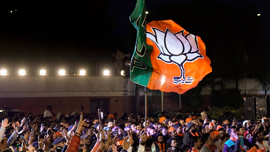 <div class="paragraphs"><p>BJP workers gather to celebrate the party’s win in the Delhi Assembly election.</p></div>