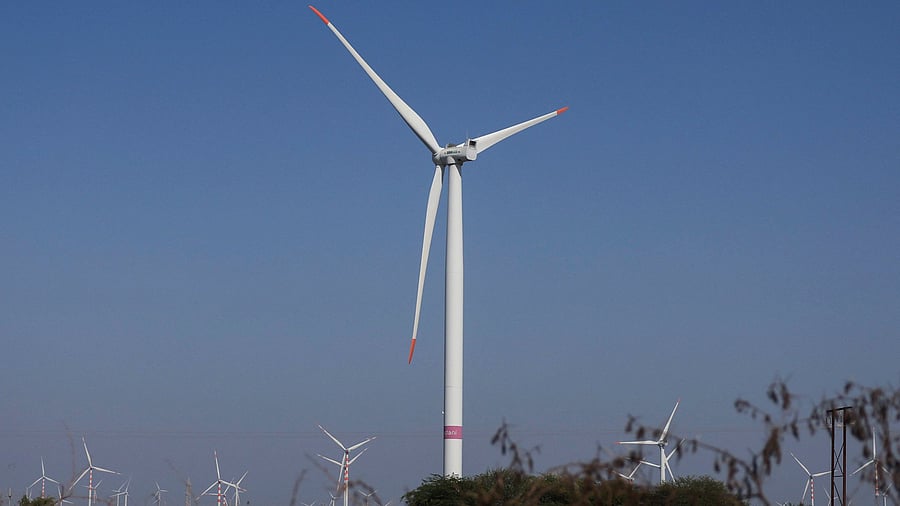 <div class="paragraphs"><p>A view of power-generating windmill turbines at a wind park of Adani Green Energy at Ahmedabad-Narayan Sarovar state highway near Nakhatrana village in the western state of Gujarat, India.</p></div>