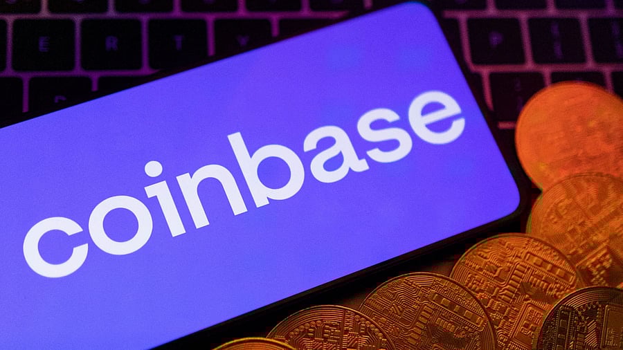 FILE PHOTO: Smartphone with displayed Coinbase logo and representation of cryptocurrencies are placed on a keyboard in this illustration taken, June 8, 2023. REUTERS/Dado Ruvic/Illustration/File Photo