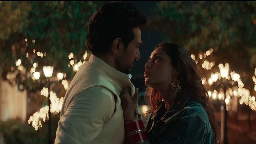 <div class="paragraphs"><p>Pratik Gandhi and&nbsp;Yami Gautam in the romcom ‘Dhoom Dhaam’.</p></div>